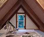 Schlafzimmer Ferienwohnung Fritzsche unterm Spitzdach mit gemütlicher Atmosphäre